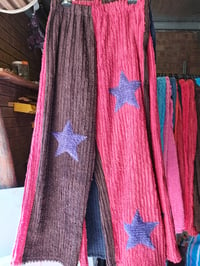 Image 1 of Star Pants Brown/red with purple stars