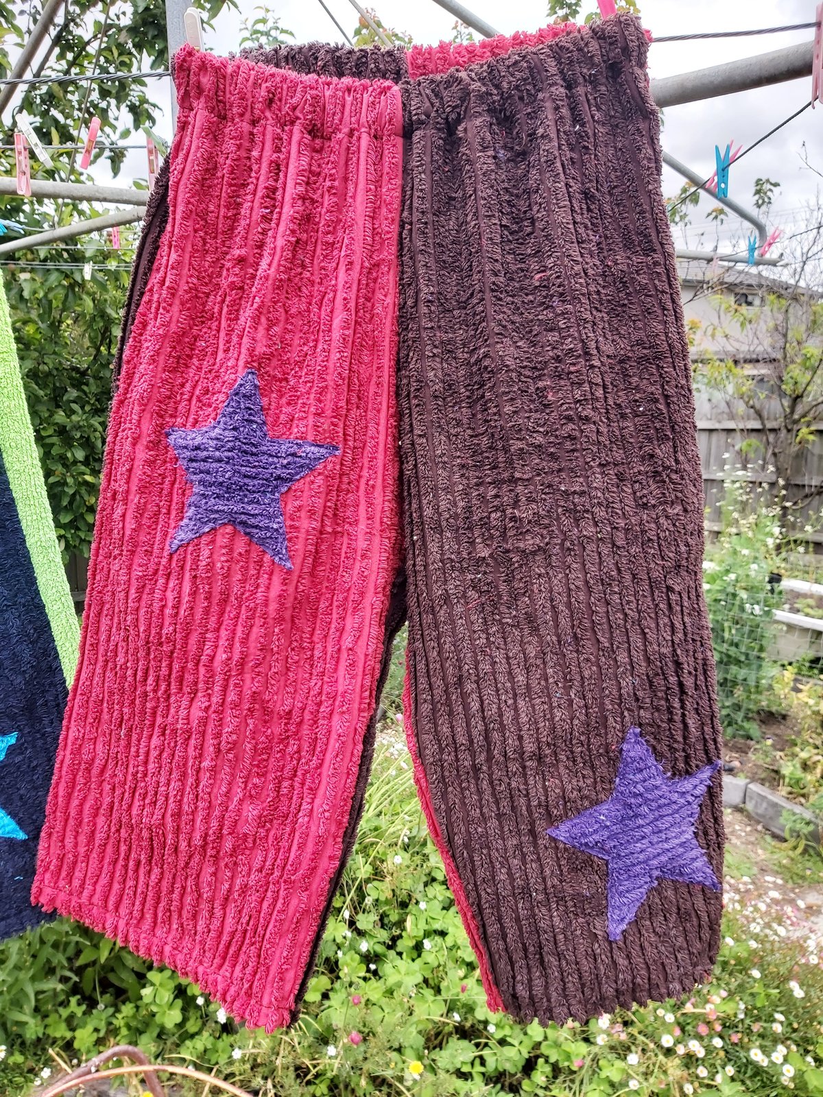 Image of Star Pants Brown/red with purple stars