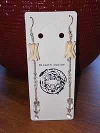 Image 2 of Clear/Silver Solitary Bone Chandelier Earrings