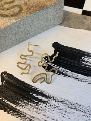 Image of ‘Intuitive Movement’ hammered brass wiggly earrings