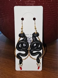 Image 2 of Black/Gold Snake Earrings