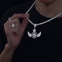 Image 2 of Spinning Globe Moissanite Diamond Pendant