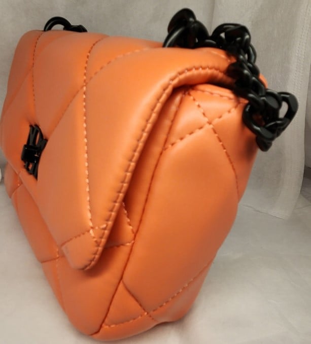 Badgley Mischka  Quilted papaya color