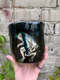 Image 3 of a silent frog plant pot