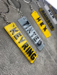 4D acrylic keyrings 