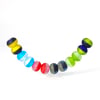 Colorful Horizons: A strand of 12 Beads