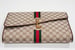 Image of Vtg. Gucci Brown Monogram Equestrian Clutch.