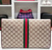 Image of Vtg. Gucci Brown Monogram Equestrian Clutch.