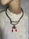 Asymmetrical Upcycled Necklace with Black And Red Gothic Charm.