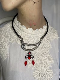 Image 2 of Asymmetrical Upcycled Necklace with Black And Red Gothic Charm.