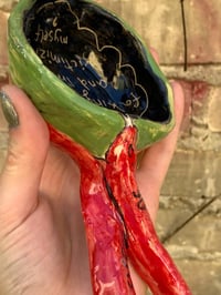 Image 2 of a bitter cup