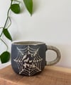 inverted skull n’ web 