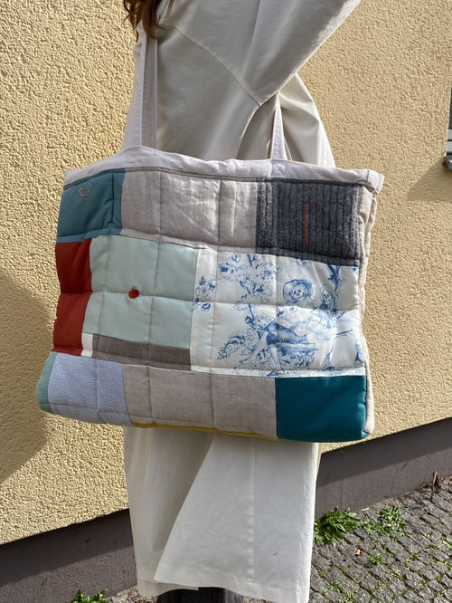 Image of Hand embroidered, patched and quilted handmade bag from leftover natural fabrics