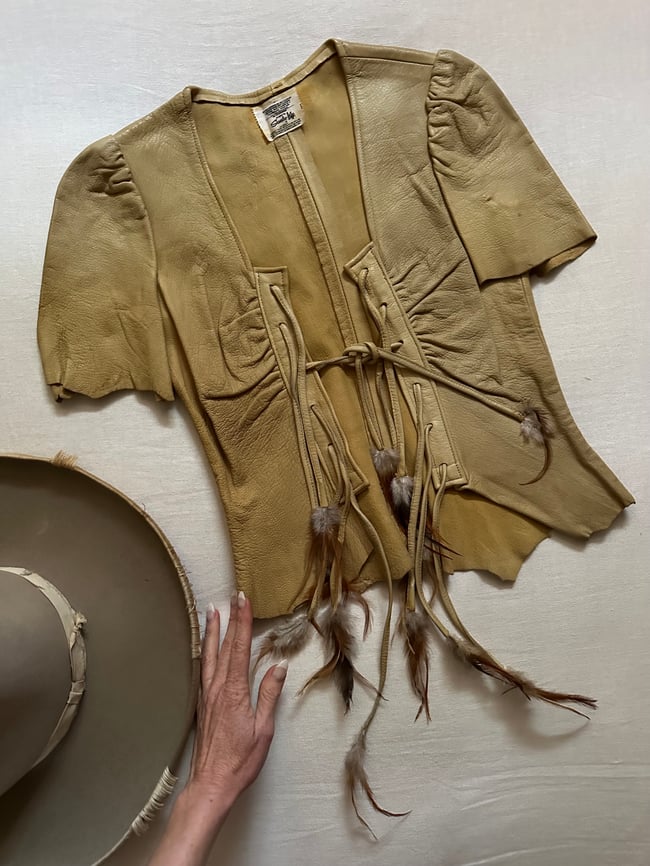 late 1960s leather and feather tie top