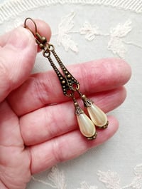 Image 3 of 1920s Art Deco Pearl Teardrop Earrings, Ivory & Bronze