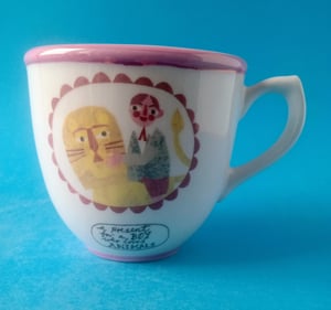 Boy and lion tea cup