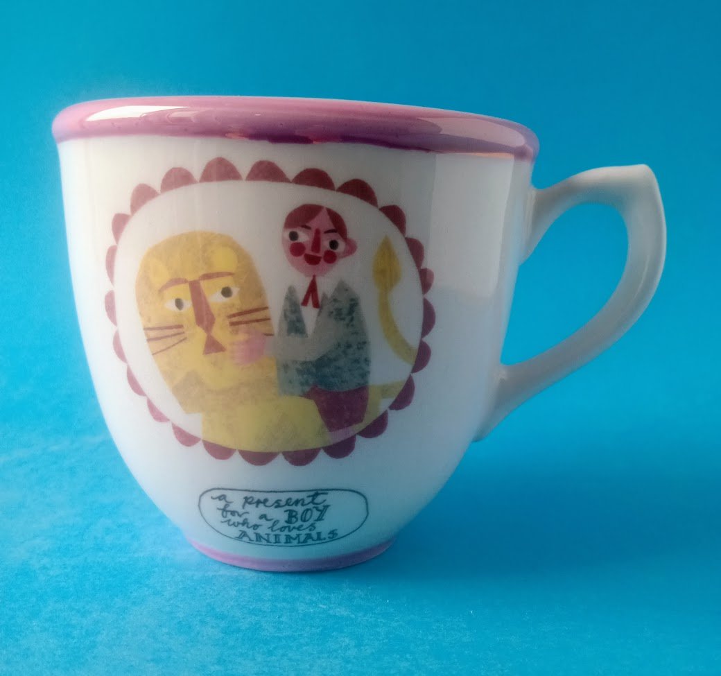 Boy and lion tea cup