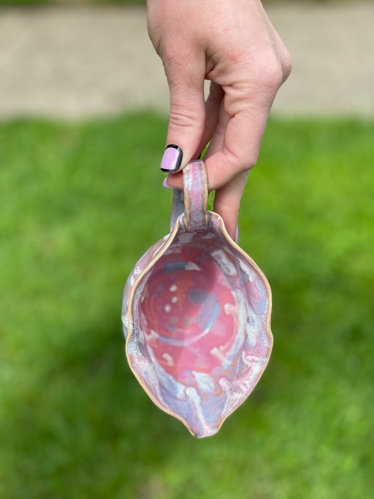 Image of drippy pink vulva creamer