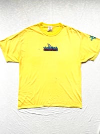 Image of shark in the water tee in yellow 