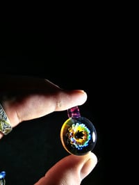 Image 1 of Psychedelic flower pendant with stargazer loop.