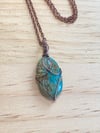 Carved Turquoise Pendant