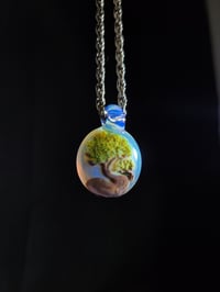 Image 2 of Bonsai tree pendant backed in ghost. 