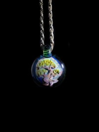 Image 2 of Bonsai tree pendant backed in green X.