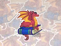 Image 1 of Red Dragon on a Blue Book - 3 inch Vinyl Sticker