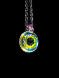 Image 2 of UV reactive psychedelic flower pendant..