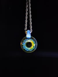 Image 2 of UV reactive psychedelic flower pendant...