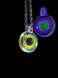 Image 1 of UV reactive psychedelic flower pendant..