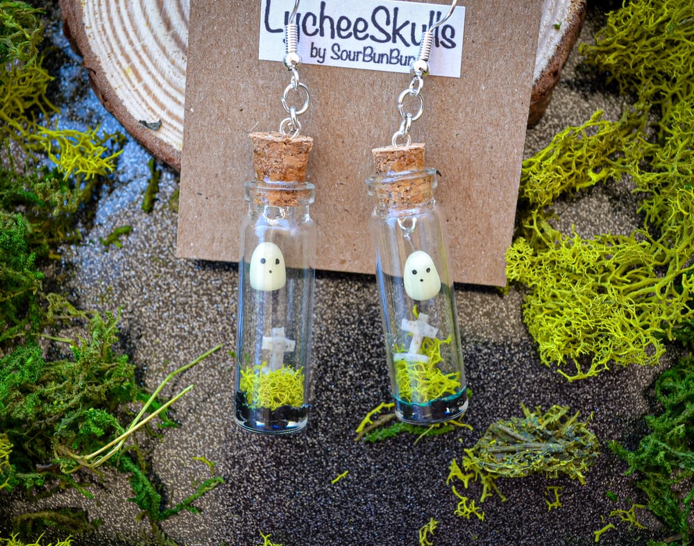 Image of Haunted Cross Terrarium Earrings GLOW IN THE DARK