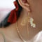 Image of Daisy Gold Flake Rainbow Bar Hook Earring