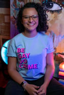 BE GAY. DO CRIME. T-shirt (Skye Blue, with pink and purple print)