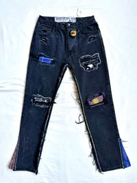 Image of a lil bit of everything patched denim pants 