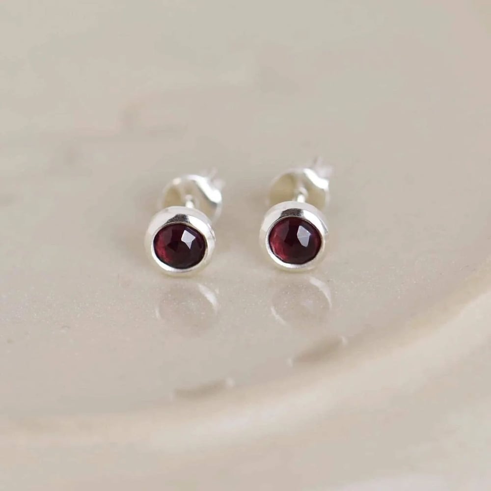 Image of Red Garnet rose cut silver stud earrings