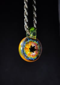 Image 1 of Psychedelic flower pendant with opal lime loop.