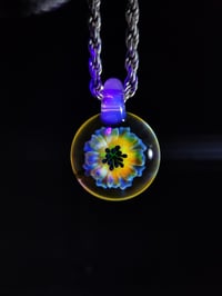 Image 1 of UV reactive psychedelic flower pendant with glopal loop.