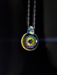 Image 3 of UV reactive psychedelic flower pendant with glopal loop.