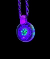 Image 2 of UV reactive psychedelic flower pendant with glopal loop.