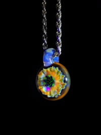 Image 3 of UV reactive psychedelic flower pendant 💎