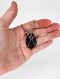 Image 2 of Wire Wrapped Round Flat Stone