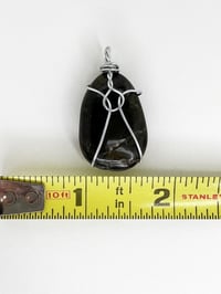 Image 3 of Wire Wrapped Round Flat Stone