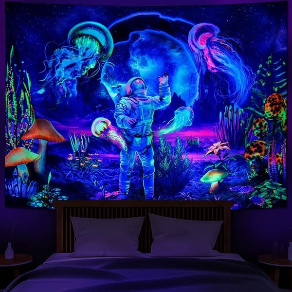 Image of Astronaut glowing in the dark tapestry 
