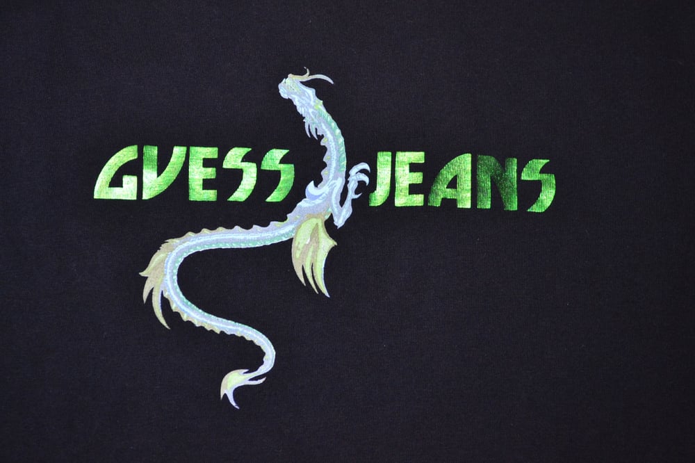 Image of Vintage 1990's Guess Jeans Dragon Print Spell Out T-Shirt Sz.L