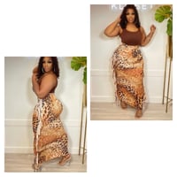 Image 1 of REGULAR SIZE  IT'S A WHOLE VIBE PRINTED FRINGED SIDE MAXI SKIRT 