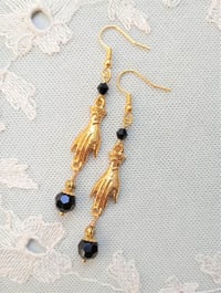 Image 1 of Victorian golden hand charm long earrings handmade with black faceted glass beads