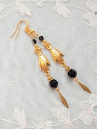 Image 5 of Victorian golden hand charm long earrings handmade with black faceted glass beads & brass drops