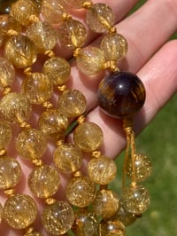 Image 1 of Gold Rutile 108 Bead Gemstone Mala with Cacoxenite in Amethyst Guru Bead, Gold Rutilated Quartz Mala