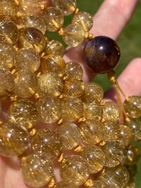 Image 2 of Gold Rutile 108 Bead Gemstone Mala with Cacoxenite in Amethyst Guru Bead, Gold Rutilated Quartz Mala